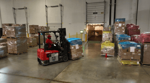 forklift loading shipments to walmart