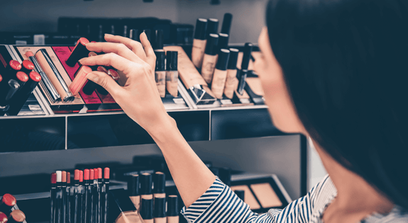 woman shopping for makeup